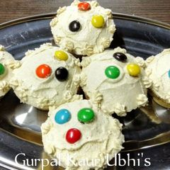 A picture of 🌈🧁 Smarties & Black Raisin Surprise Cupcakes 🧁 | Colourful & Delicious!.