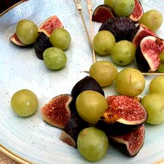 A picture of Fruit skewers and yogurt dip.