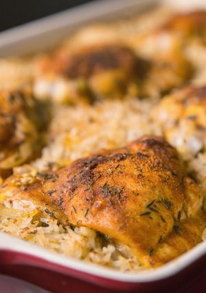 A picture of Oven baked chicken and rice.
