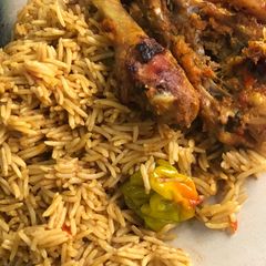 Cinnamon rice and grill chicken A picture of Cinnamon rice and grill chicken.