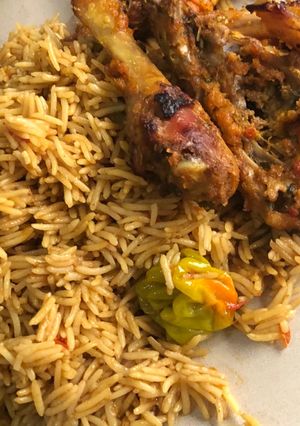 A picture of Cinnamon rice and grill chicken.