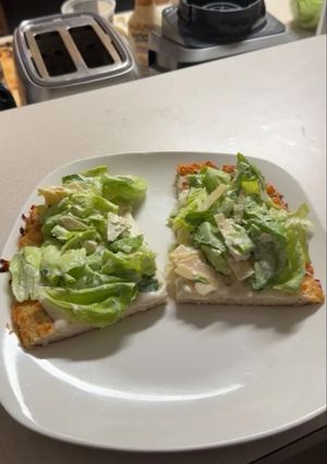 A picture of Ground Chicken Caesar Salad Pizza.