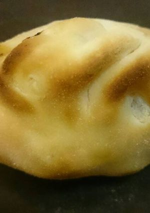 Una foto de Empanadas de panceta, ciruela y cebolla