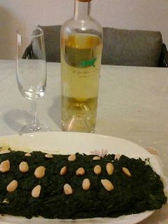 Una foto de Rollo de espinacas con jamón serrano y queso crema