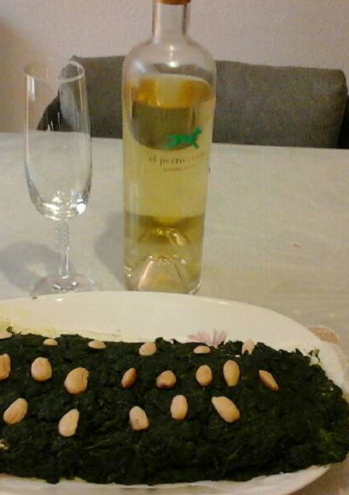 Una foto de Rollo de espinacas con jamón serrano y queso crema