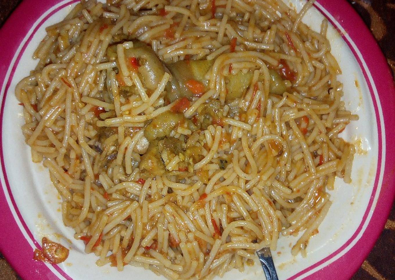 Jollof spaghetti with chicken