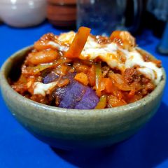 Steamed sweet potato with chilli con carne A picture of Steamed sweet potato with chilli con carne.