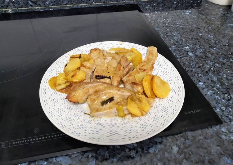 Secreto de cerdo ibérico. Al horno, con patatas