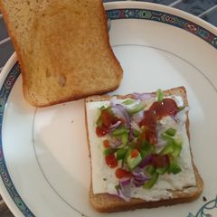 Hung curd, boil corn, bell pepper, onion cheese sandwich A picture of Hung curd, boil corn, bell pepper, onion cheese sandwich.