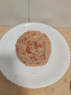 Una foto de Arroz con tomate