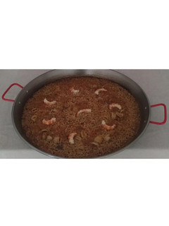 Una foto de Paella de gambes i calamars 🦐🦑