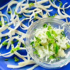 A picture of Grated radish salad (mooli ka laccha).