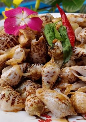 Hình của món Ốc nhảy xào bơ phomai.