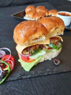 A picture of Veg Patty Subway Pav with Barbeque sauce.