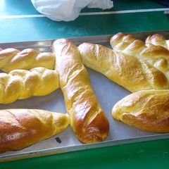 Vienna, twisted bread, baughettess and plated bread A picture of Vienna, twisted bread, baughettess and plated bread.