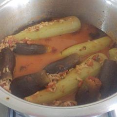 A picture of Vegetarian stuffed zucchini, eggplants.