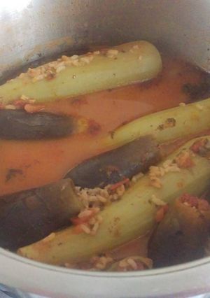 A picture of Vegetarian stuffed zucchini, eggplants.