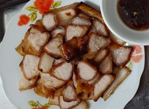 Hình của món Thịt lợn chiên mặn ngọt.