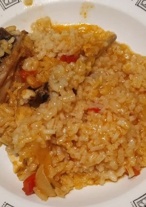 Una foto de Arroz caldoso con pollo