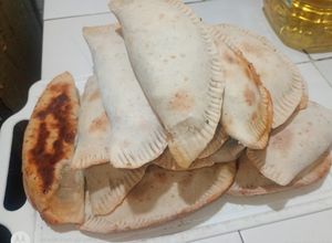 Una foto de Empanadas o tarta de capón