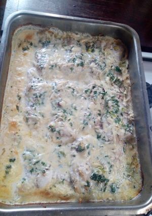 Una foto de Filetes de Pescadilla, al horno en crema de leche
