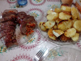 Carne rellena con papas al horno