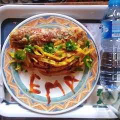 A picture of French-Celery fries with fried eggs.