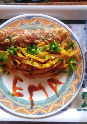 A picture of French-Celery fries with fried eggs.