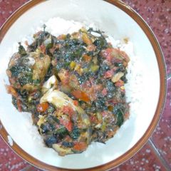 A picture of White and vegetable stew.