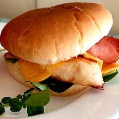 A Plain Chicken Bacon & Cheese Burger with Watercress A picture of A Plain Chicken Bacon & Cheese Burger with Watercress.