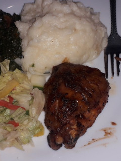 A picture of Mashed potatoes creamy spinach with grilled chicken and salad.