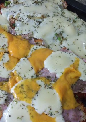 Una foto de Milapizza de pollo