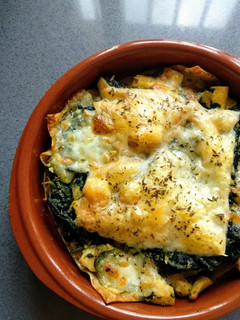 Una foto de Lasaña de espinacas, coliflor y pollo gratinados