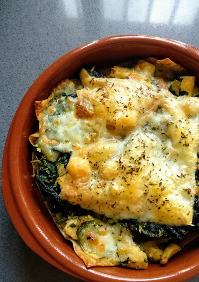 Una foto de Lasaña de espinacas, coliflor y pollo gratinados