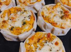 Una foto de Canastitas de zapallo (anco)🧀🍅🌽🧅