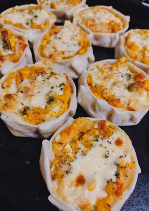 Una foto de Canastitas de zapallo (anco)🧀🍅🌽🧅