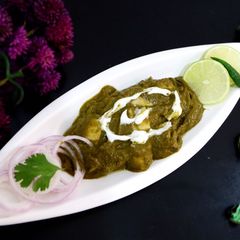 A picture of Palak Paneer | Cottage Cheese with Spinach Gravy.