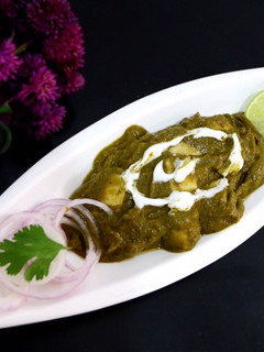 A picture of Palak Paneer | Cottage Cheese with Spinach Gravy.