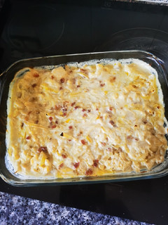 Una foto de Coliflor en salsa bechamel con taquitos de jamón
