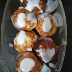 Banana appam with white sauce A picture of Banana appam with white sauce.