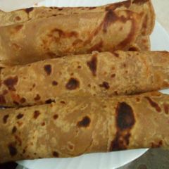 Soft brown chapatis A picture of Soft brown chapatis.
