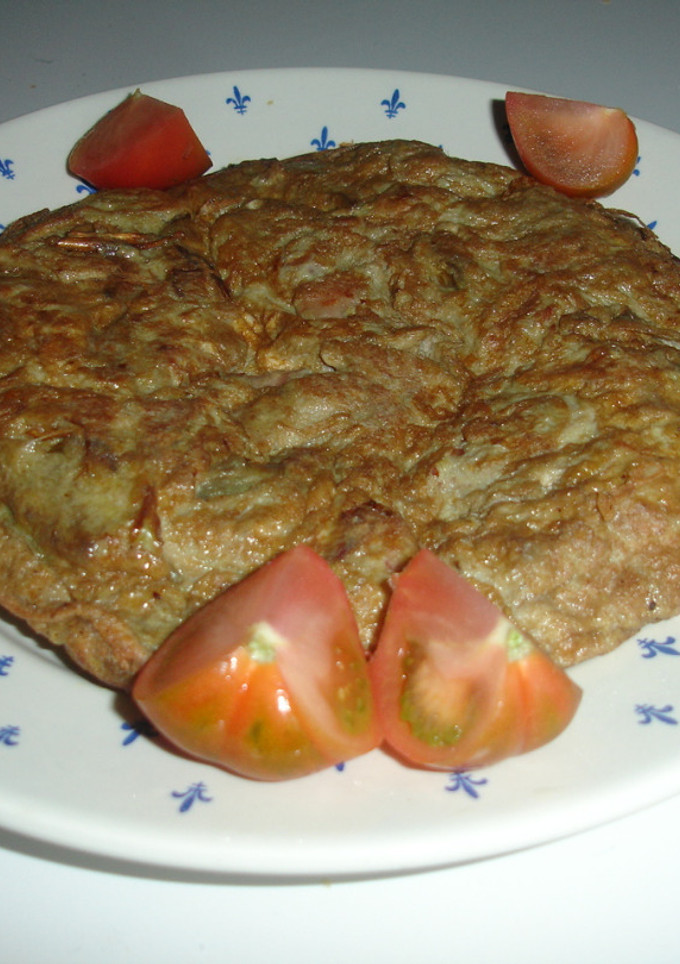 Una foto de Tortilla de alcachofas y jamón cocido