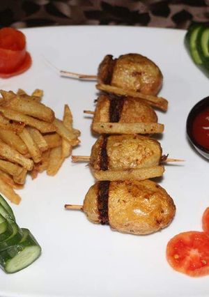 A picture of Fried potato basket with fries 😋.