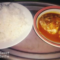 A picture of Fisherman stew with rice.