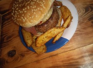 Una foto de Hamburguesa rellena de queso Oaxaca