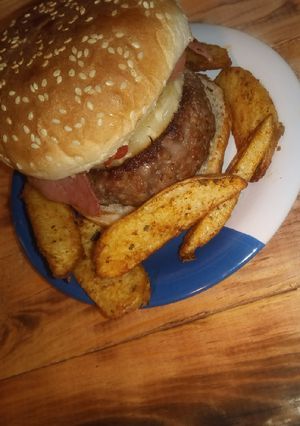 Una foto de Hamburguesa rellena de queso Oaxaca