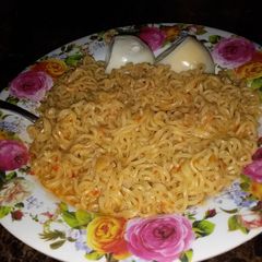 A picture of Indomie and boiled egg.