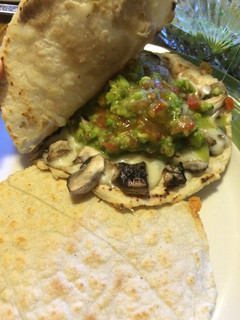 Una foto de Quesadilla de Hongos