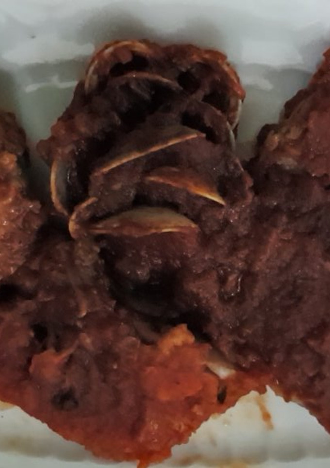 Una foto de Pescado con tomate y chirlas  27