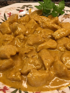 Una foto de Magro de pollo en salsa al curry